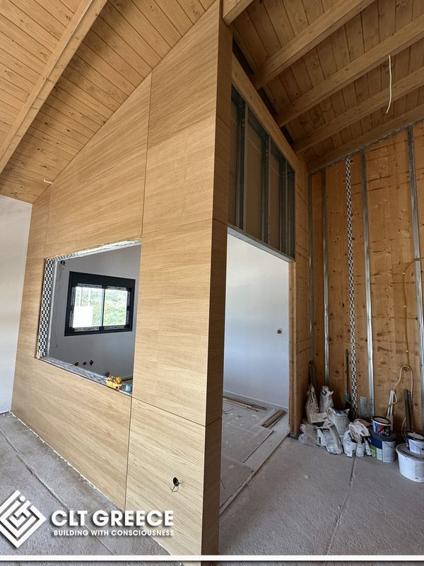 Inside the CLT house in Preveza with its exposed timber ceiling (2)