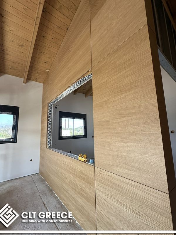 Inside the CLT house in Preveza with its exposed timber ceiling (3)