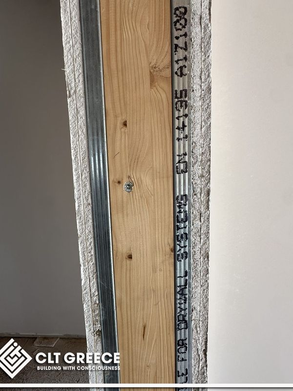 Inside the CLT house in Preveza with its exposed timber ceiling (6)