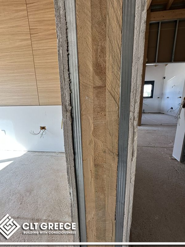 Inside the CLT house in Preveza with its exposed timber ceiling (9)