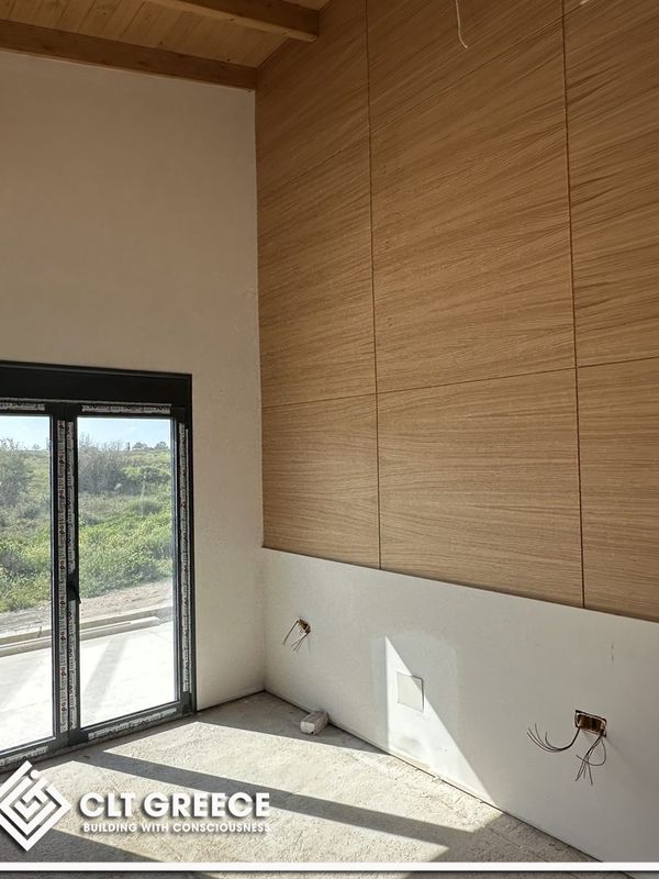 Inside the CLT house in Preveza with its exposed timber ceiling (12)