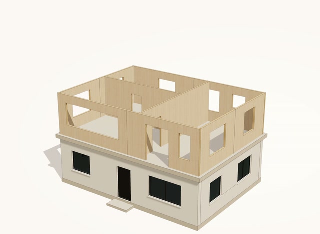 Load-bearing CLT wall panels of the new storey, with pre-cut openings, on the existing house